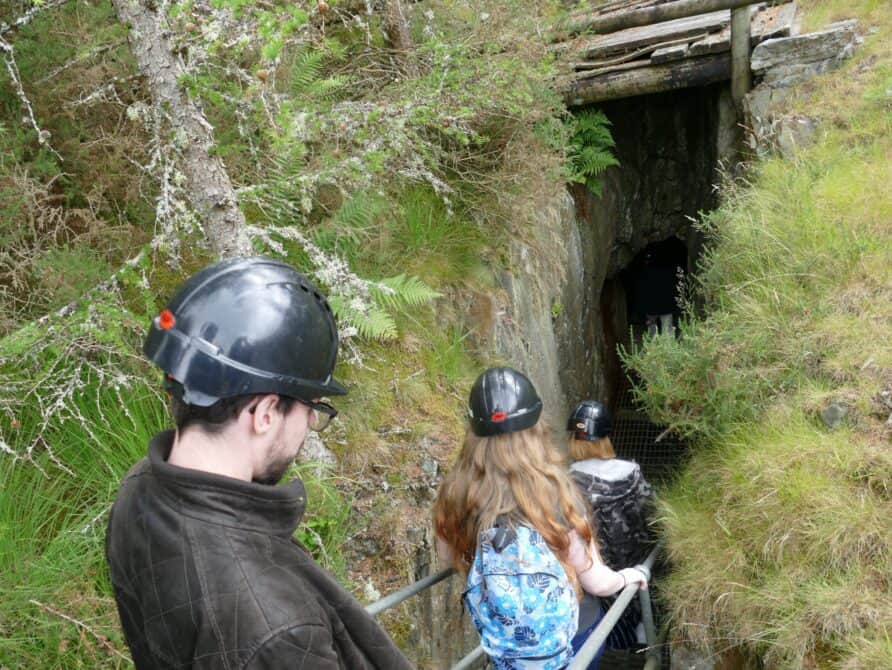 Visitors entering tunnel at Silver Mountain Experience